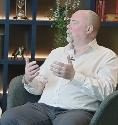 Robert Sugrue speaking during the fireside chat